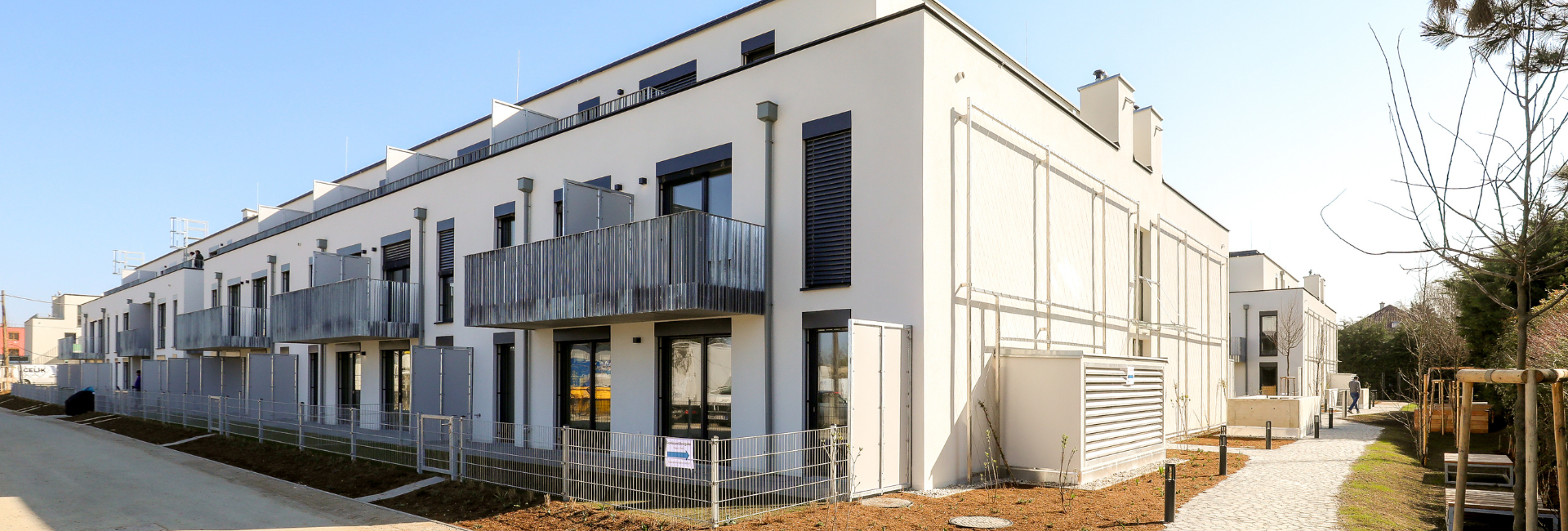 CO₂-neutraler Gemeindebau Brockhausengasse in Wien mit Betonteilaktivierung und begrüntem Innenhof