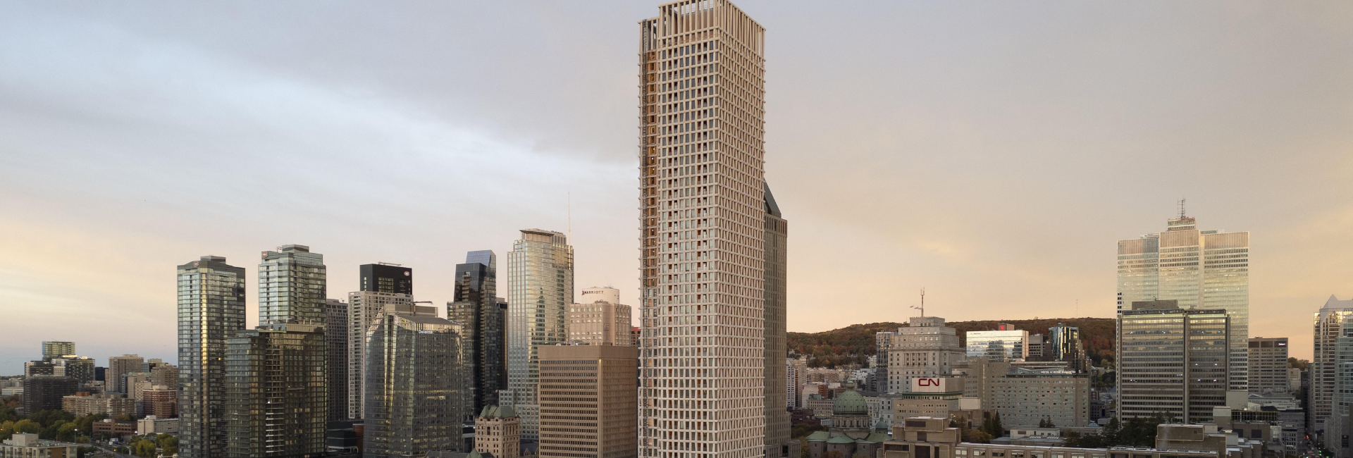 Skyla Wohnturm in Montréal mit markanter Fassade aus Betonfertigteilen und Sichtbeton im Innenraum