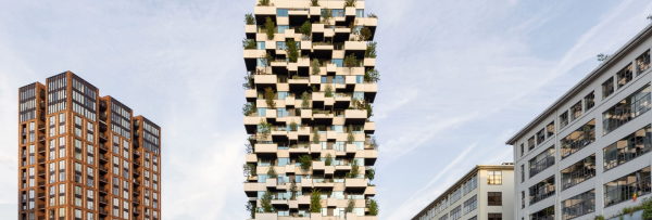 Trudo Vertical Forest in Eindhoven mit Betonfertigteil-Balkonen, Bäumen und sozialem Wohnbau